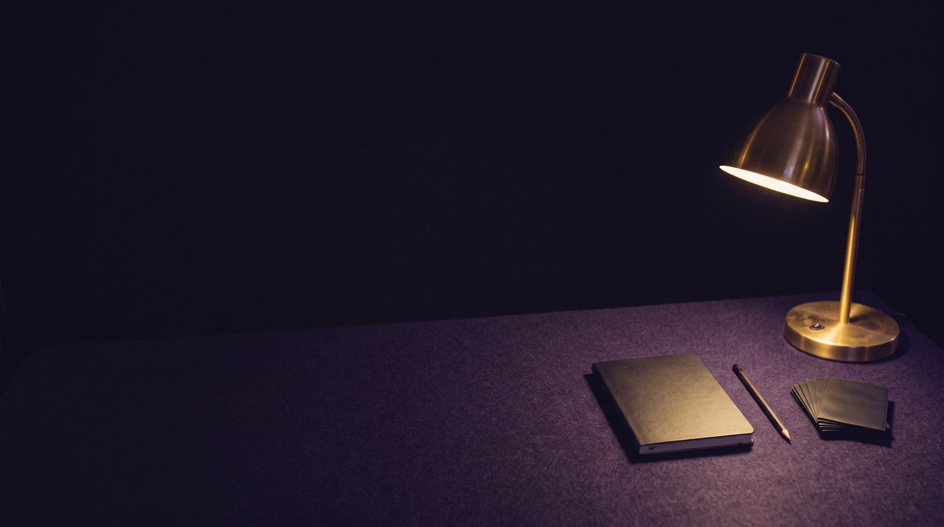 A brass lamp on the counter at GH Games, as designed